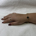 PULSERA 5 TREBOL DORADA CON PIEDRA NEGRA / PLATA .925 BAÑO DE ORO 18K