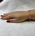 PULSERA DE 5 TREBOL DORADA CON TREBOL ROSA / PLATA .925 BAÑO DE ORO 18K