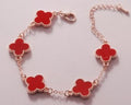 PULSERA 5 TREBOL ROSA CON PIEDRAS ROJAS / PLATA .925 BAÑO DE ORO 18K